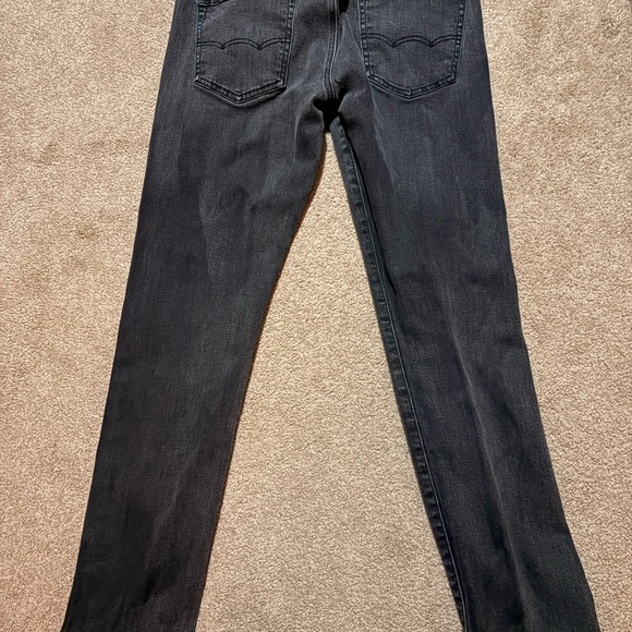 American Eagle Limited Edition: Slim black-wash jeans with red stitching. - Picture 2 of 4